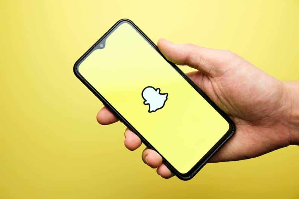 Launch your Snapchat application and ensure you are logged